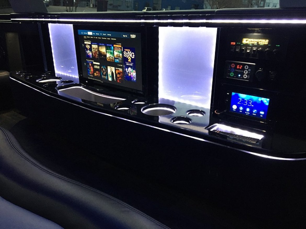 Limousine bar and entertainment center